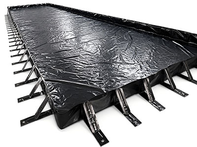 Portable spill containment berm for land fuel storage leak control