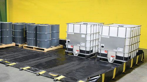 Spill containment berm used for secondary containment in an industrial site