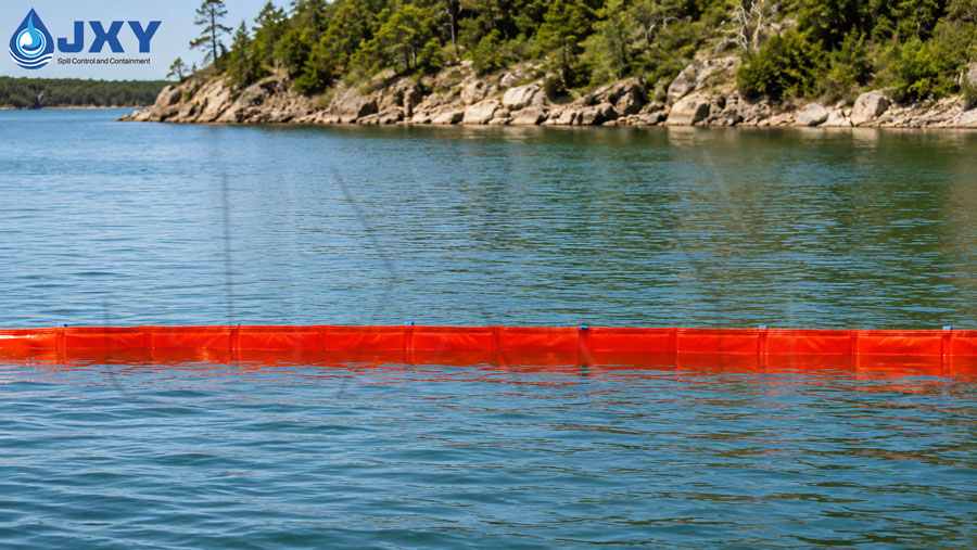 Fence boom installed on the water to contain oil spills