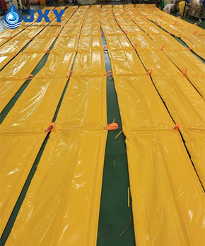 oil containment boom protecting marine environment from oil spills