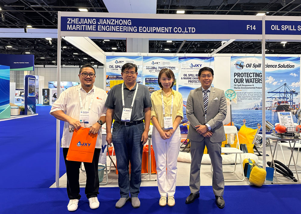 JXY team meeting marine spill response professionals at SpillAsia 2026